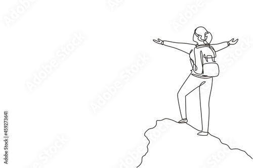 Single continuous line drawing climber woman stands with arms outstretched on top of mountain. Winner motivational concept. Tourist with backpack. Traveler in summer rocks. One line draw design vector
