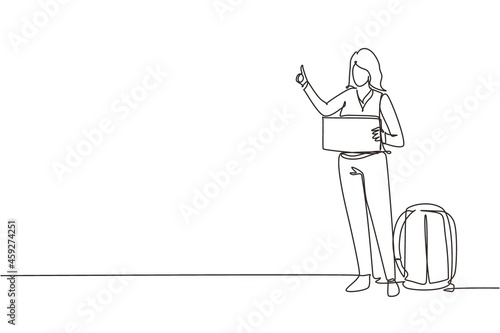 Single one line drawing women with luggage and thumbs up waiting for car by roadside. Hitchhiking road travel. Vacation and trip concept. Modern continuous line draw design graphic vector illustration