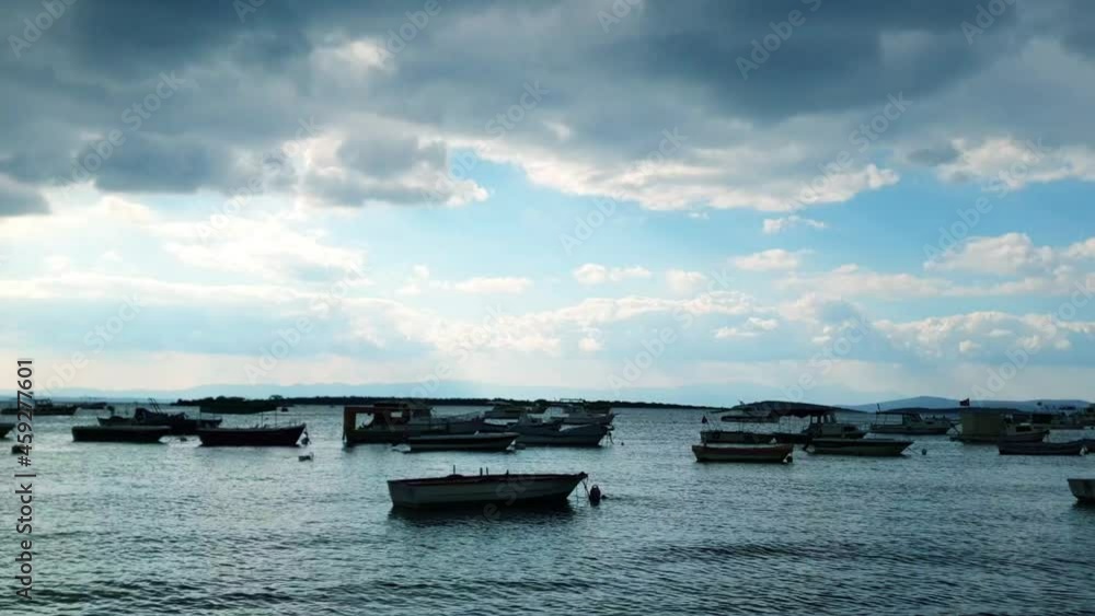 Silhouette of fishing boats moored to shore after sunset. Silhouette of fishing boats moored to shore after sunset.