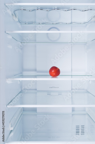 nectarine fruit in the refrigerator on the shelf, on a white background
