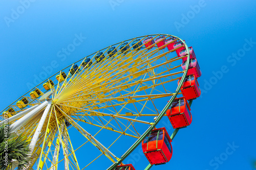 Multi color fly wheel on a sunny day, Myrtle Beach, SC photo