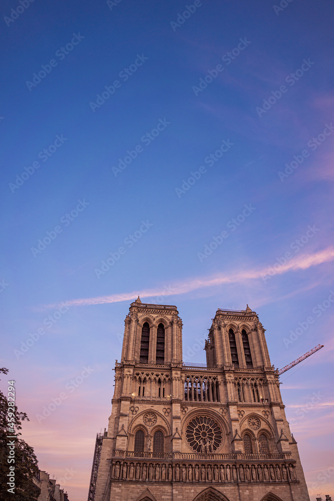 Detail of Notre Dame cathedral against sky