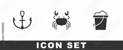 Set Anchor, Crab and Sand in bucket icon. Vector