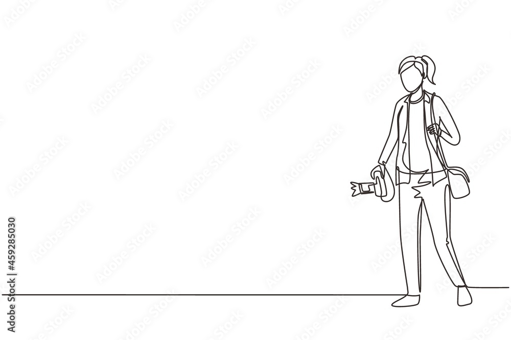 Single continuous line drawing woman hipster photographer with holding camera in photo studio. Photographer female using professional camera in the studio. One line draw design vector illustration