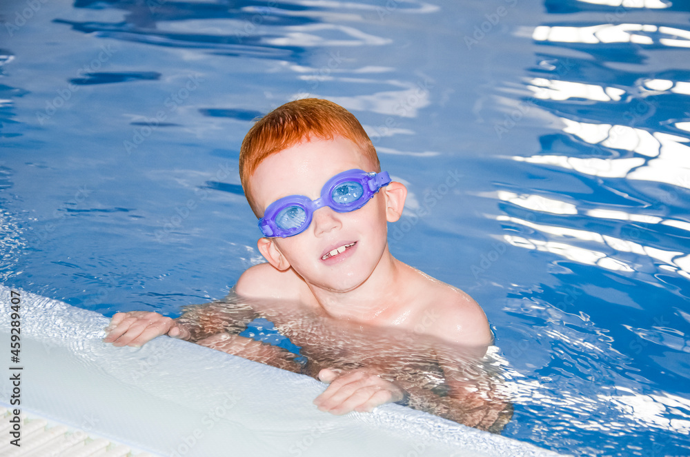 Naklejka premium A child in the pool