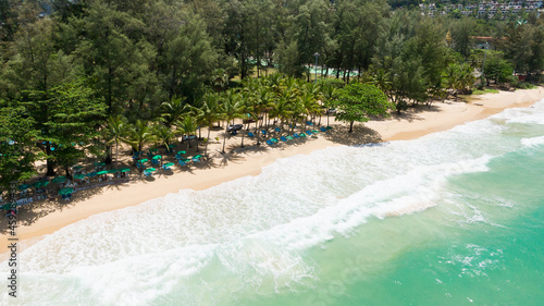 Drone shot,Top view of Beautiful sea crystal and Popular beach. Umbrella and chairs