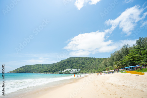 Amazing palms on island blue sky and clouds background. sun light in summer