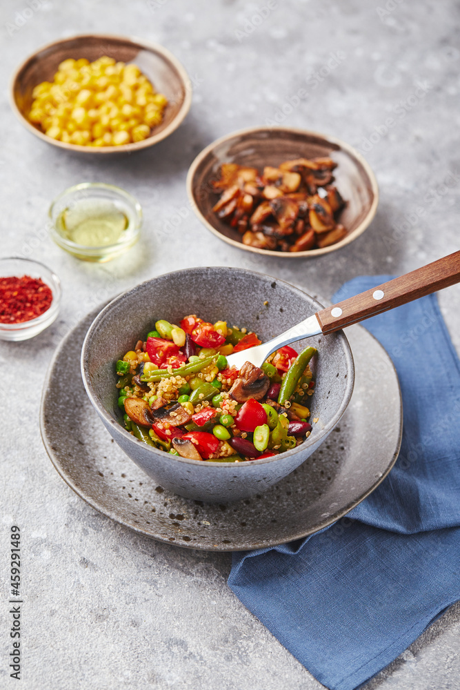Quinoa with green beans, tomatoes, fried champignons, corn, red bell peppers, peas and soybeans. Healthy Vegetable Mix Quinoa with green beans, tomatoes, fried champignons, corn, red bell peppers, peas and soybeans. Healthy Vegetable Mix