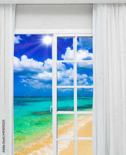 tropical paradise from an open door at home © dbrus