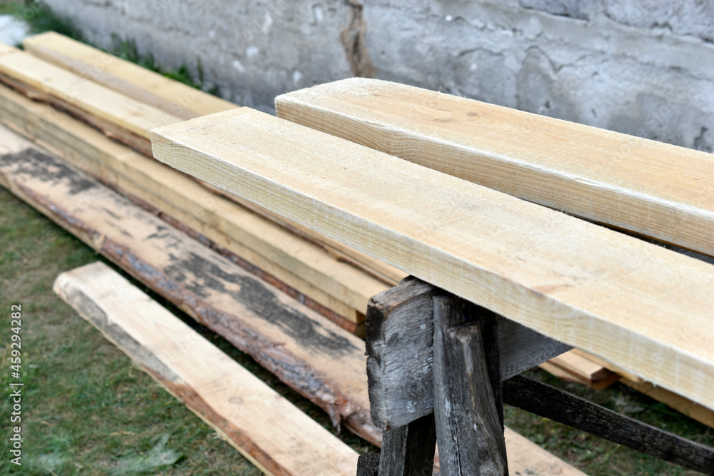 Pine white construction boards at the sawmill Pine white construction boards at the sawmill