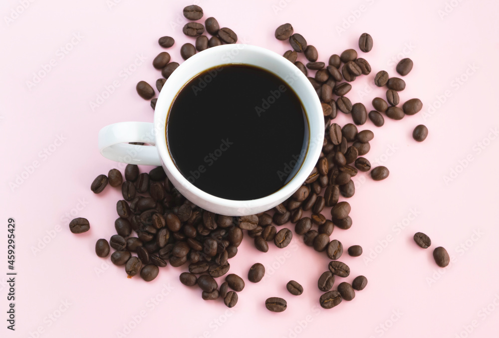 White ceramic cup with black coffee put on background White ceramic cup with black coffee put on background
