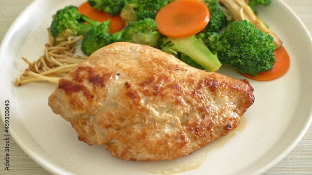grilled chicken steak with vegetable on white plate grilled chicken steak with vegetable on white plate