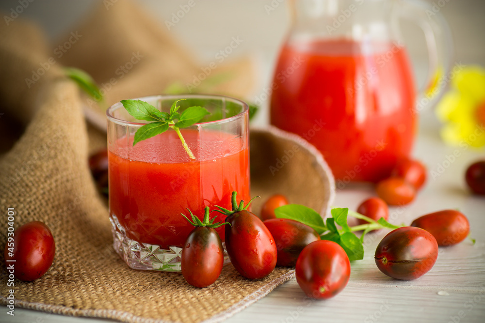 homemade freshly squeezed tomato juice with pulp in a glass decanter homemade freshly squeezed tomato juice with pulp in a glass decanter