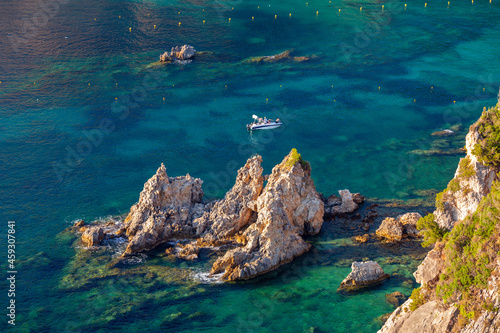 Fototapeta Naklejka Na Ścianę i Meble -  Greece. Corfu. Rocks against the background of the blue Mediterranean sea.