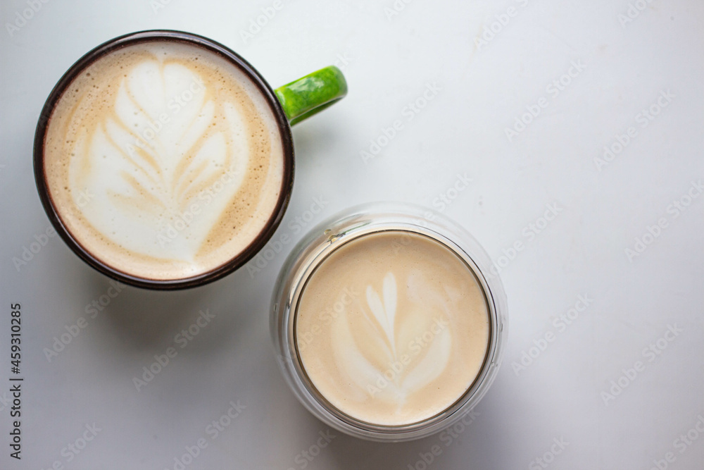 latte art in a cup. handmade brew coffee. morning vives latte art in a cup. handmade brew coffee. morning vives
