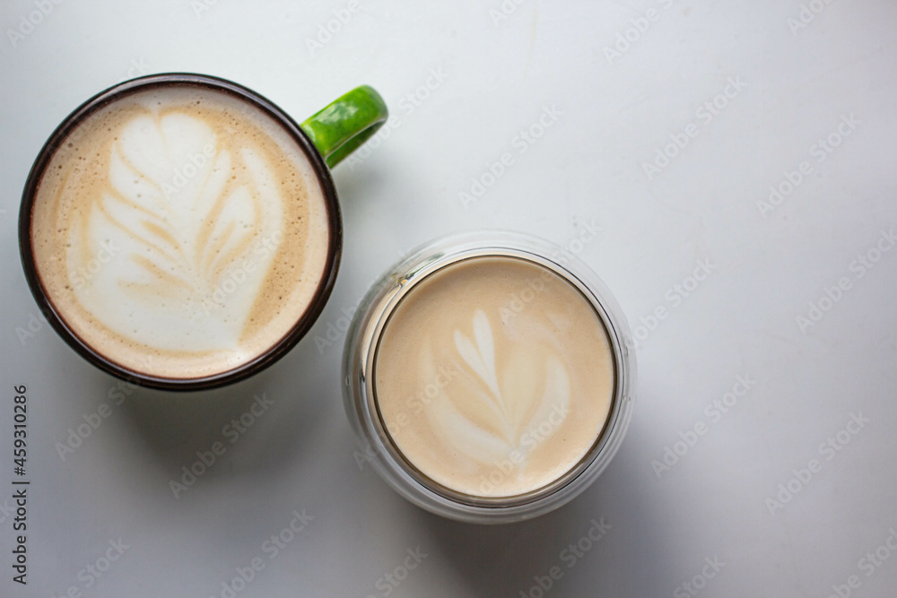 latte art in a cup. handmade brew coffee. morning vives latte art in a cup. handmade brew coffee. morning vives