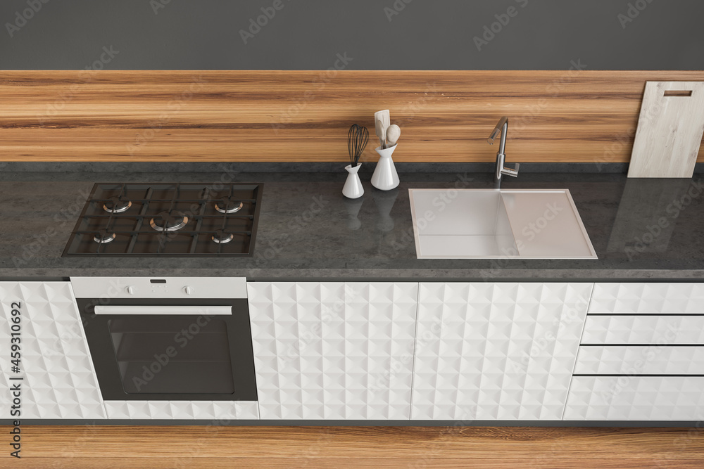 Top view of stylish kitchen with textured white cabinets Top view of stylish kitchen with textured white cabinets