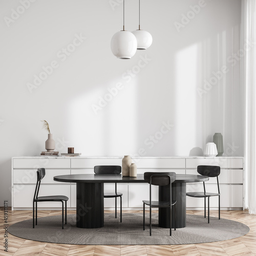 Obraz na plátně Bright living room interior with four chairs, dining table, sideboard