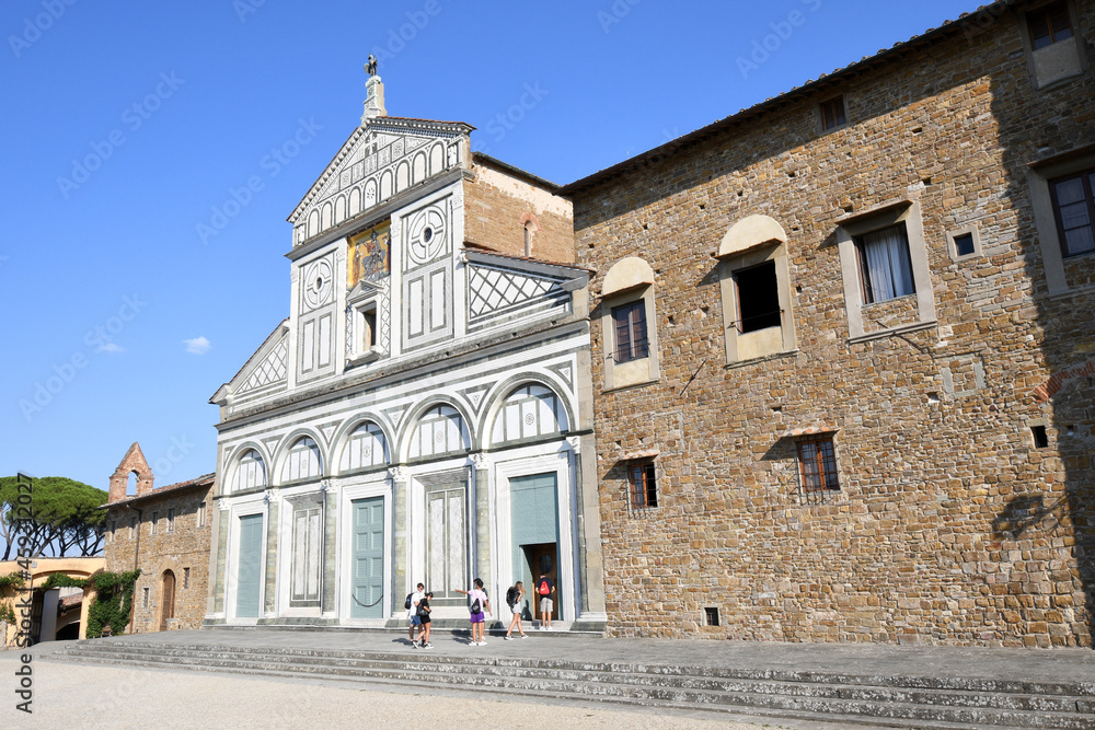 Florence, September 2021: Tourists enter the famous leading to the Basilica of San Miniato which is located in one of the highest places in the city of Florence. Italy.