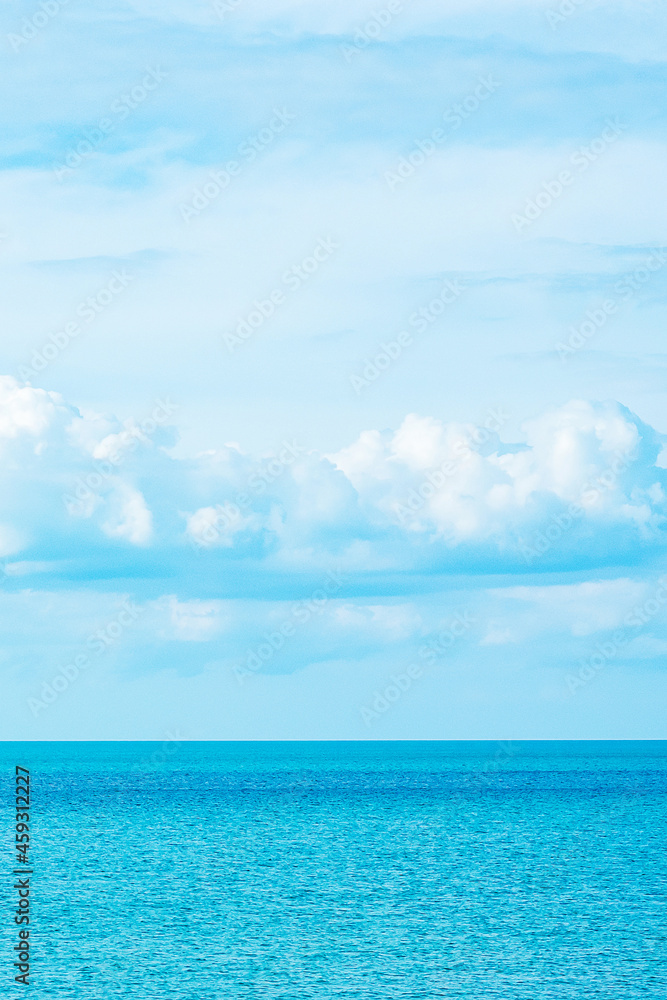 beautiful ocean and blue sky background. Relaxing, summer,  travel, holiday and vacation concept