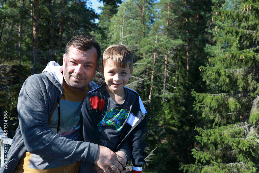 Father with son in forest at Gora Filina Father with son in forest at Gora Filina