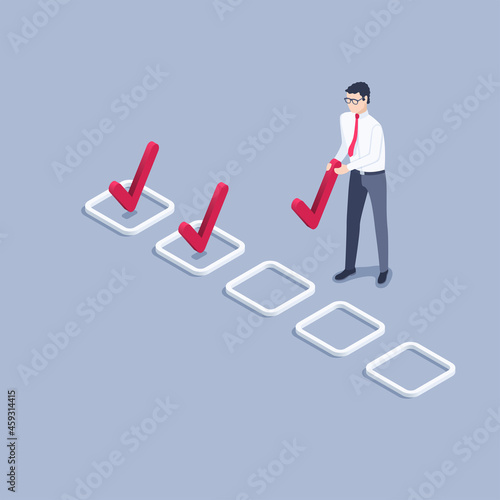 isometric vector illustration on gray background, man in business clothes putting check mark in the box, testing or planning