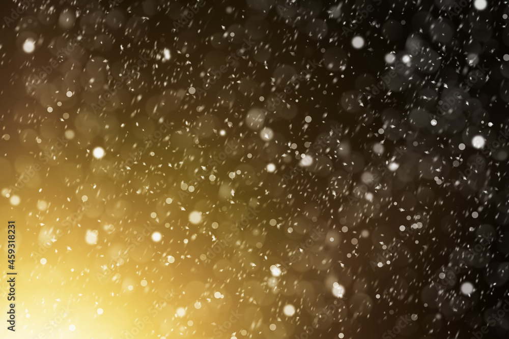 abstract Christmas background with blurred snowflakes in bright light
