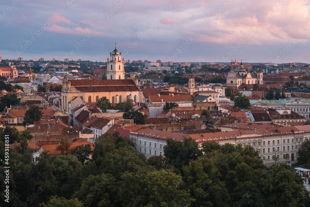 VIlnius / Lithuania - August 12 2021: View over the Old Town of Vilnius in summer at sunset, amazing baltic touristic city in Lithuania, Europe
