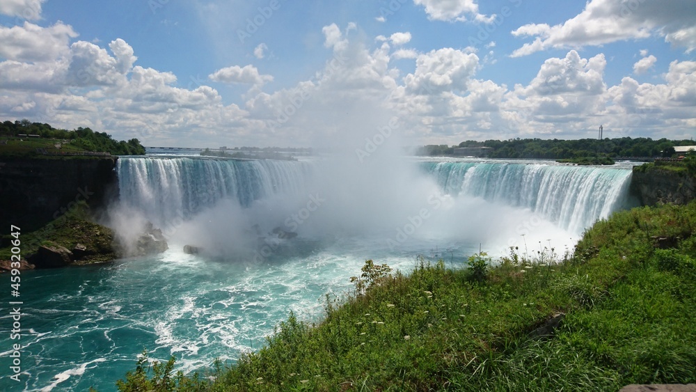 Fototapeta premium Photo of the beautiful Niagara Falls at day and night and different seasons in Ontario, Canada.