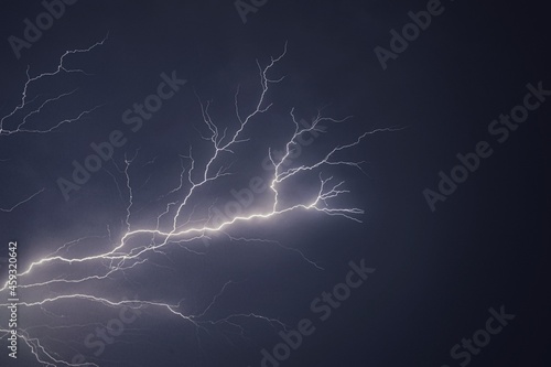 Lightning and thunder pictured during a rainstorm in deccan region of india monsoon season