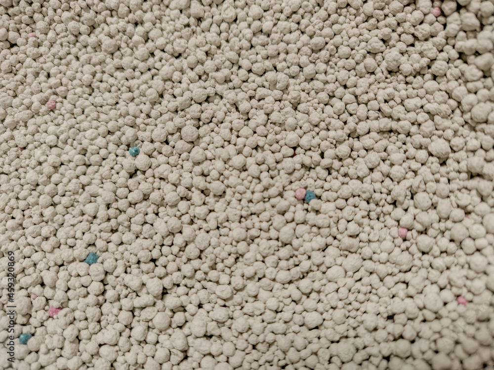 A close up shot of bentonite white colored pet litter sand A close up shot of bentonite white colored pet litter sand