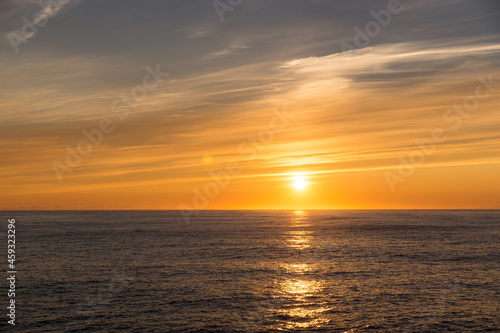 Sea landscape, vivid sunset. Cliffs on the horizon. © Igor Chaikovskiy