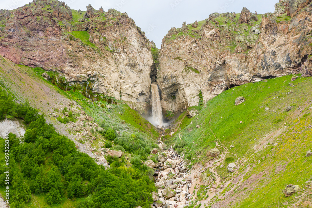 Mountain waterfall Sultan, a stormy stream. Mountains and waterfalls of the North Caucasus, Gily-Su tract. The Republic of Kabardino-Balkaria, Russia.