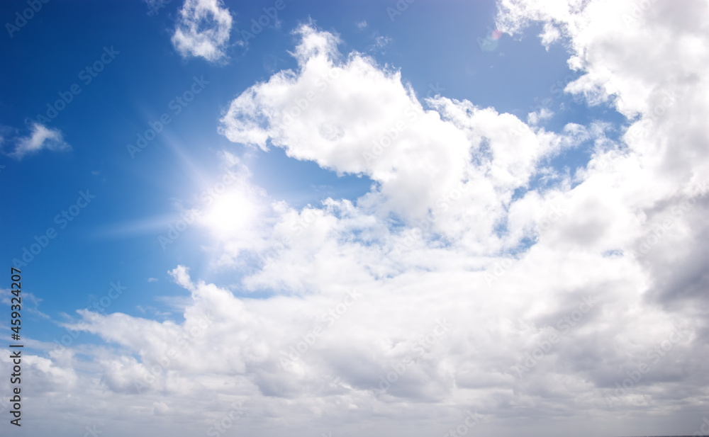 Fototapeta premium Blue sky with clouds on a Sunny day.