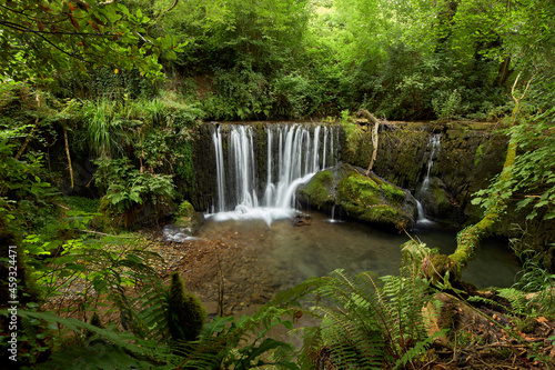 Beautiful waterfall in a forest in Galicia, Spain, known by the name of San Pedro de Incio.