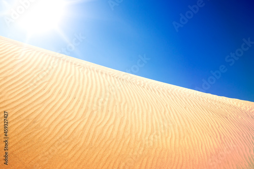 Blue sky and sand dunes. Sunny day.