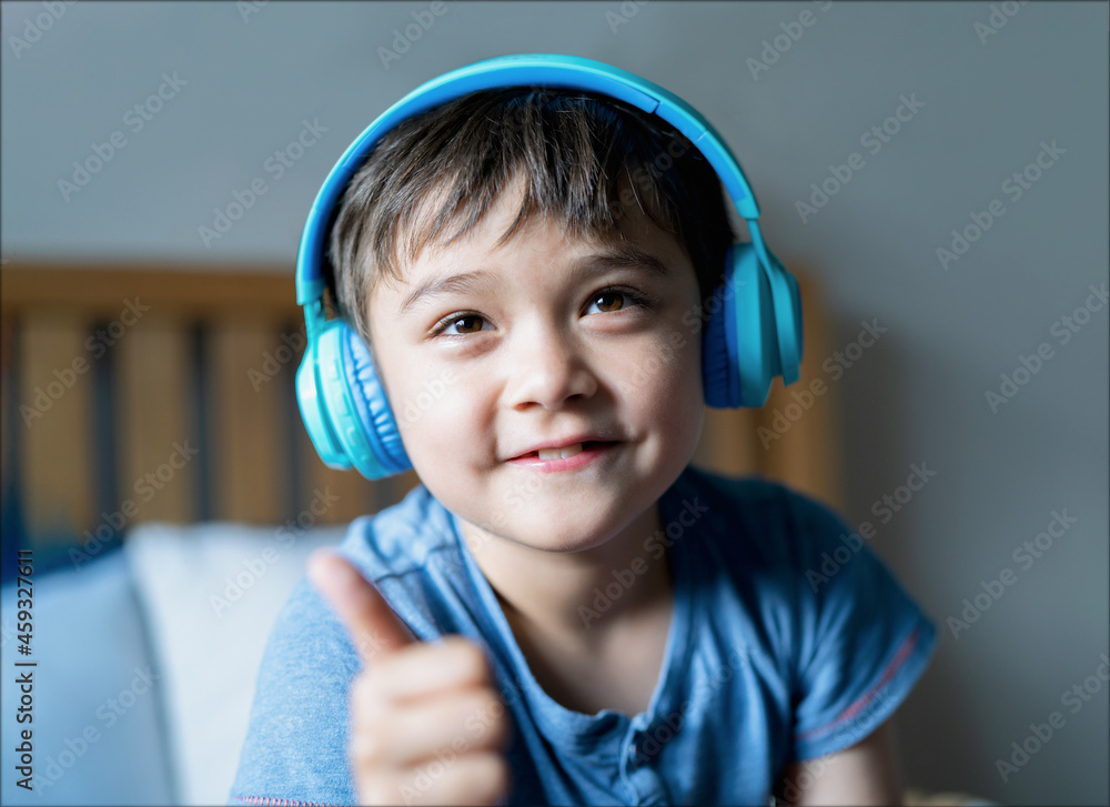 Kid wearing headphones hotsell