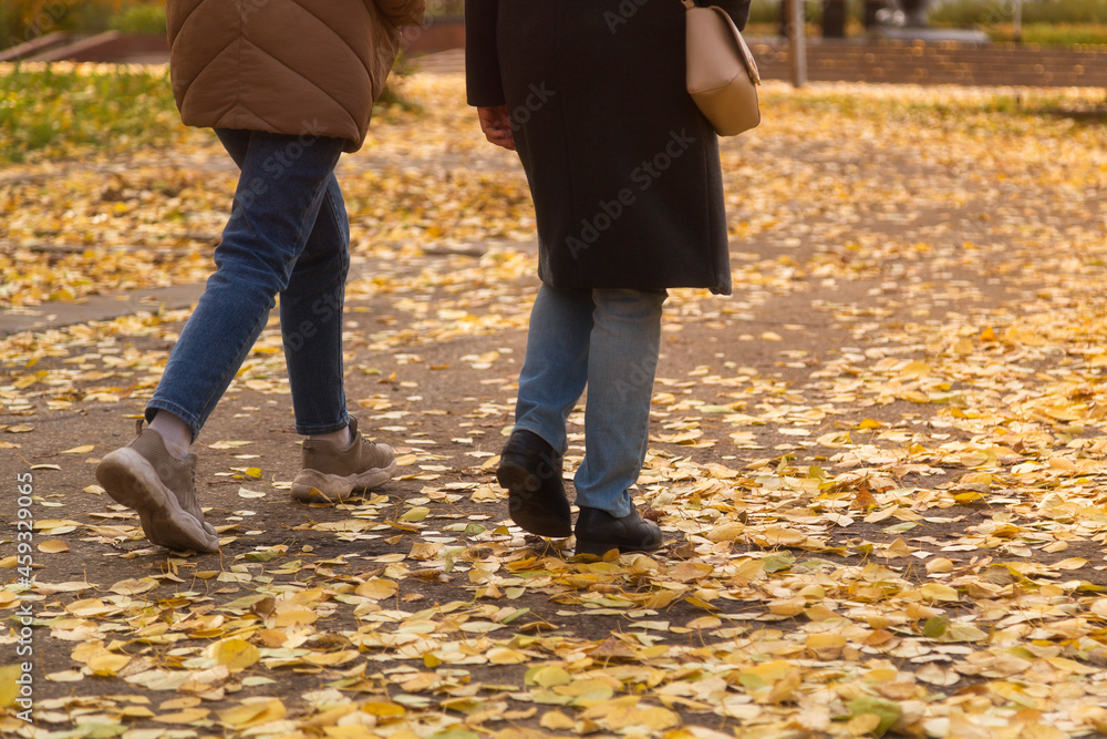 People are walking around the autumn city.A walk around the city. People are walking around the autumn city.A walk around the city.