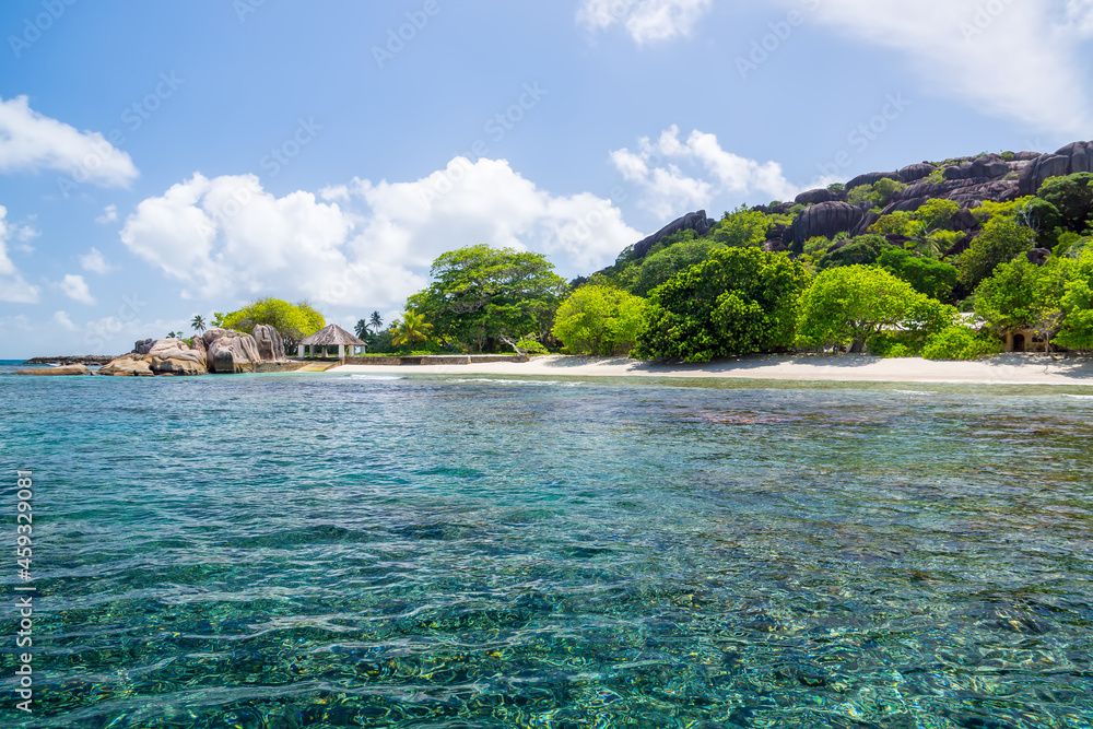 Beautiful nature on the shore of the turquoise waters of the ocean. The Seychelles. Beautiful nature on the shore of the turquoise waters of the ocean. The Seychelles.