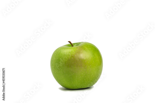 Fresh green apple, side view isolated on white background with shadow.