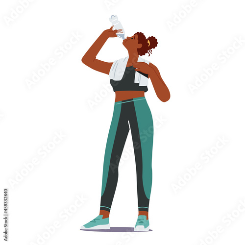 Athletic Beautiful Sportswoman with Towel on Shoulder Drinking Water from Bottle Refreshing after Fitness Sport Activity