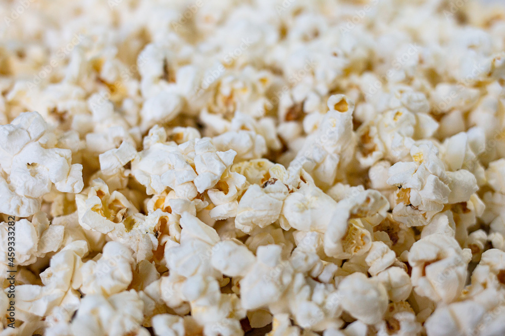 Salted popcorn, texture background. Film and cinema concept Salted popcorn, texture background. Film and cinema concept