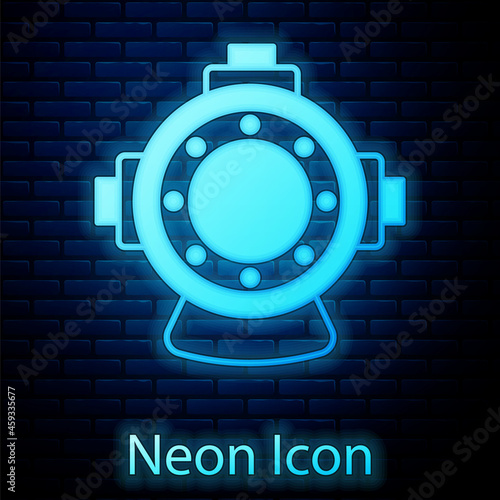 Glowing neon Aqualung icon isolated on brick wall background. Diving helmet. Diving underwater equipment. Vector
