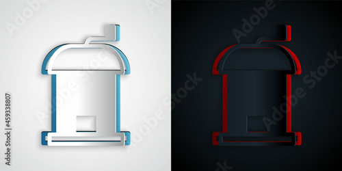 Paper cut Manual coffee grinder icon isolated on grey and black background. Paper art style. Vector