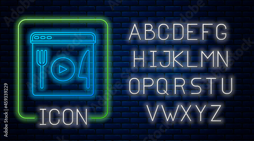 Glowing neon Cooking live streaming icon isolated on brick wall background. Neon light alphabet. Vector