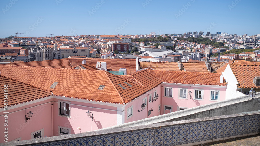 Top wiew of the Lisbon from one of the streets of the Alfama district, Portugal.
