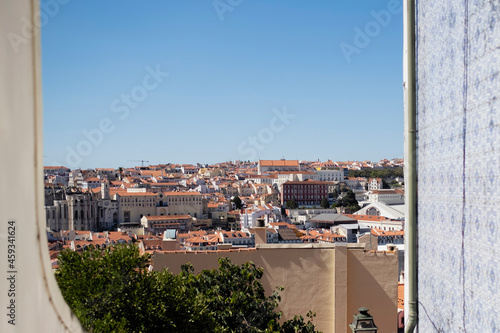 View of the Lisbon from one of the Alfama district streets, Portugal.