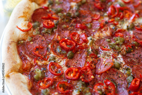 Pepperoni pizza with salami and jalapeno chili. Very spicy and delicious pizza.