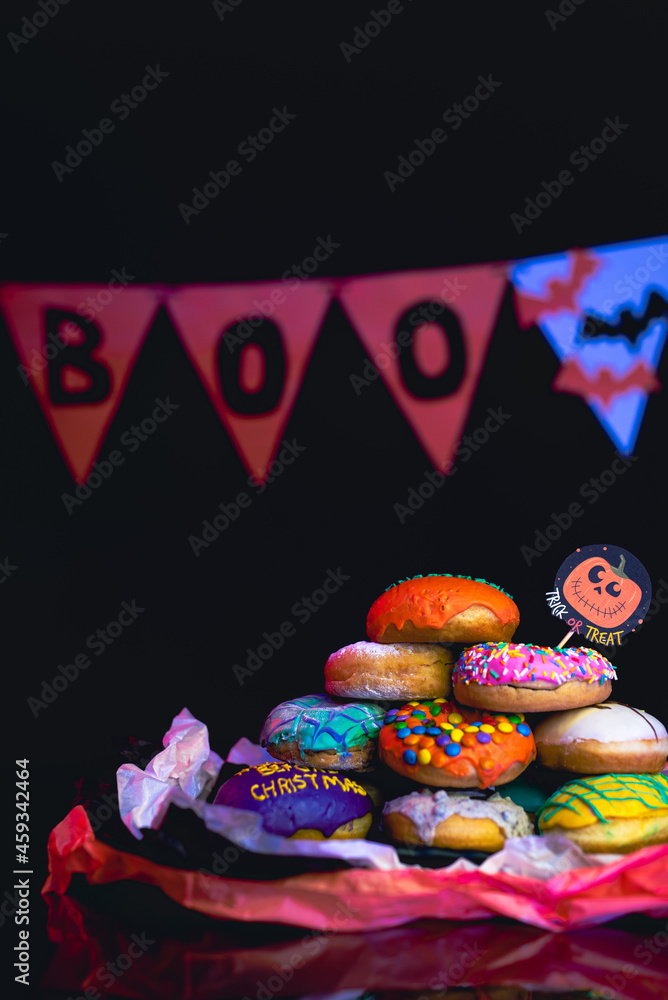 Halloween Donuts Celebration Candy Trick or Treat Spooky Dessert with Dark Background