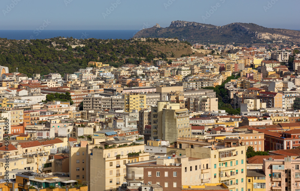 Panoramic view of the city of Cagliari, Italy, from the Castello district, with the Devil's Saddle in the background Panoramic view of the city of Cagliari, Italy, from the Castello district, with the Devil's Saddle in the background